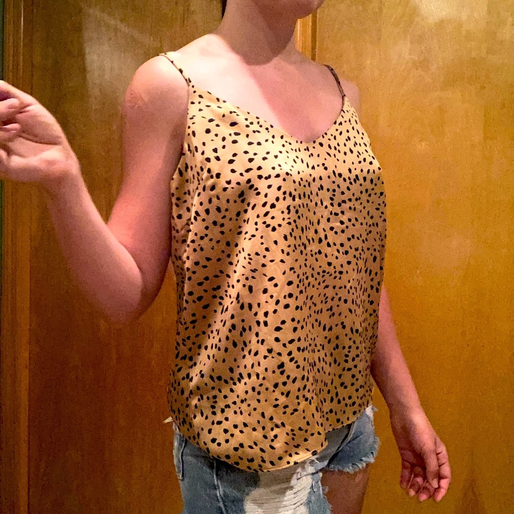 Fun leopard top. Adjustable straps.